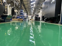 a green floor in a factory